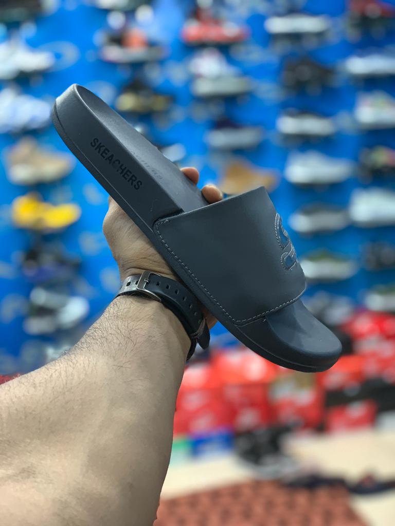 Gray Skechers Slippers