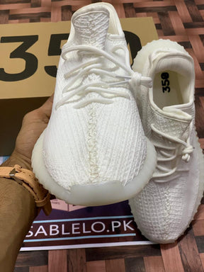 Yeezy 350 Triple White - Premium Shoes from Sablelo.pk - Just Rs.7999! Shop now at Sablelo.pk